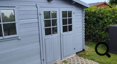 Gartenlaube Schleifen und Streichen